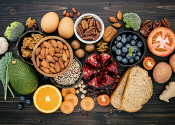 Ingredients for the healthy foods selection. The concept of healthy food set up on wooden background.