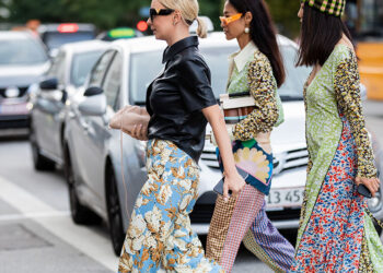 COPENHAGEN, DENMARK - AUGUST 08: Guests seen wearing prints and pattern outside Ganni during Copenhagen Fashion Week Spring/Summer 2020 on August 08, 2019 in Copenhagen, Denmark. (Photo by Christian Vierig/Getty Images)