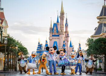 This undated photo provided by Walt Disney World shows Disney characters at Walt Disney World in Lake Buena Vista, Fla. Walt Disney World is planning an 18-month celebration in honor of its 50th anniversary, starting in October 2021. Disney announced Tuesday, June 22 that all four parks at the resort will take part in “The World’s Most Magical Celebration." (Matt Stroshane/Walt Disney World via AP)