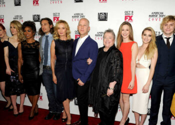 The cast and producers of "American Horror Story" arrive at American Horror Story: Coven Premiere Event, on Saturday, October 5, 2013, at the Pacific Design Center in West Hollywood, Calif. (L-R): Frances Conroy, Sarah Paulson, Angela Basett, Brad Falchuk, Jessica Lange, Ryan Murphy, Kathy Bates, Taissa Farmiga, Emma Roberts, Evan Peters (Photo by Frank Micelotta/Invision for FX/AP Images)