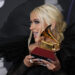 Christina Aguilera posesHn the Hess room with the award for best traditional pop vocal album for "Aguilera" at the 23rd annual Latin Grammy Awards at the Mandalay Bay Michelob Ultra Arena on Thursday, Nov. 17, 2022, in Las Vegas. (AP Photo/John Locher) *** Local Caption *** .