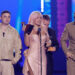 SEVILLE, SPAIN - NOVEMBER 16: (L-R) Kevyn Mauricio Cruz, Karol G Papá G and Ovy On The Drums accept the Album of the Year award during the 24th Annual Latin Grammy Awards on November 16, 2023 in Seville, Spain. (Photo by Kevin Winter/Getty Images for Latin Recording Academy)